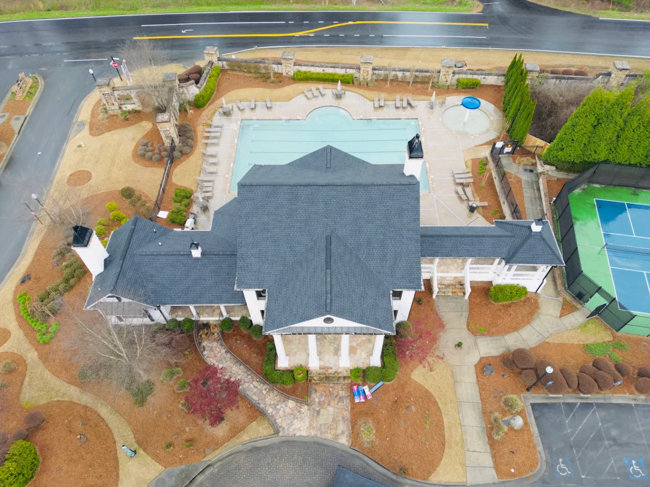 Completed shingle roof on a neighborhood clubhouse and pool pavilion